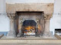 Medieval room of Stirling Castle with marble hearth and fireplace