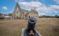 Medieval Royal Garrison church with cannon in front in Old Portsmouth, Hampshire, UK