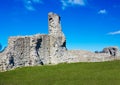 Medieval ruins on a grassy hill Royalty Free Stock Photo