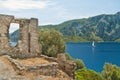 Medieval ruins with sea and mountains at background