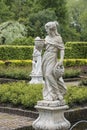 Medieval sensual female sculpture in the gardens of Castle of Arcen, Netherlands