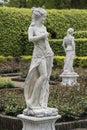 Medieval sensual female sculpture in the gardens of Castle of Arcen, Netherlands Royalty Free Stock Photo