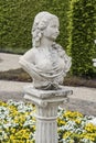 Medieval sensual woman sculpture in the gardens of Castle of Arcen, Netherlands