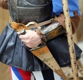 Medieval soldier with his hand on the sheath knife during a comb Royalty Free Stock Photo