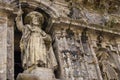 Medieval statue of Saint Jacob at the church facade. Symbol of pilgrimage and travel. Monument of catholic saint James.