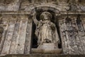 Medieval statue of Saint Jacob at the church facade. Symbol of pilgrimage and travel. Monument of catholic saint James.