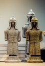 Medieval steel and gold colored armours on display