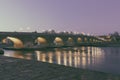 Medieval stone bridge over the Danube River in Regensburg, Bavaria, Germany Royalty Free Stock Photo