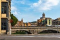 Girona, Spain, August 2018. A bridge across the former moat and a view of the city.