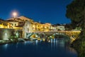 Medieval stone bridge in Prato, Italy Royalty Free Stock Photo