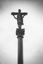 Medieval stone column with celtic cross in vignette frame. Ancient cross on Camino de Santiago black and white.