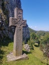 Medieval stone cross with religious symbols Royalty Free Stock Photo