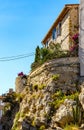 Medieval stone defense tower house at Rue Barque en Cannes street in historic old town of Antibes resort city in France