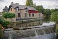 An ancient mill structure in Malestroit, Brittany, France, once used water power from the mill race on the Oust River. Royalty Free Stock Photo