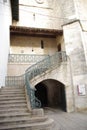 Medieval stone staircase and forged iron railing Royalty Free Stock Photo