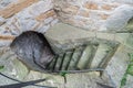 Medieval stone staircase with heavy cellar door in a historic building castle Zollernschloss, Germany Royalty Free Stock Photo