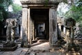 Medieval stone statue of a headless man. Ancient ruins in Cambodia