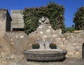 Medieval stone water fountain Royalty Free Stock Photo