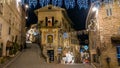 Medieval street of Assisi with christmas decorations at winter night, Umbria Royalty Free Stock Photo