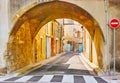 The medieval street behind the Arc Mauleon pass, Tarascon, France Royalty Free Stock Photo