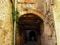 Medieval street in the form of a tunnel in the historical part of the Cervera town in Catalonia Lleida, Spain. Narrow low arched