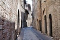 Medieval street in the Italian hill town of Assisi. Royalty Free Stock Photo