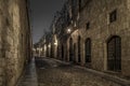 Medieval Street of the Knights called Ippoton with cobblestone road in Old town of Rhodes city in Rhodes island, Greece Royalty Free Stock Photo