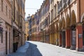 Medieval street in old town of Modena, Italy