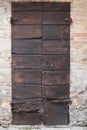 Medieval style wooden door, photographed in Italy