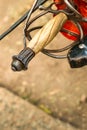 Medieval sword with a wooden handle and an iron hilt on a stone background close-up Royalty Free Stock Photo