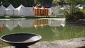 Medieval tents, green lake and empty bowl, Castle Satzvey