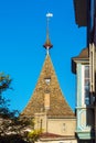 Medieval tiled roof of a tower and a vane with lion, Zurich, Switzerland