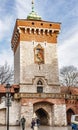 Medieval tower with entrance Gate to Florianska street, Cracow, Poland