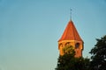 Medieval tower in sunlight against a blue sky in Gdansk, Poland. Royalty Free Stock Photo