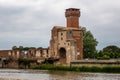 Medieval tower Torre Guelfa, on the banks of the river Arno, in the Citadella area of Pisa, Tuscany, Italy