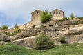 Medieval towers on a high cliff above the mountain valley in the famous ancient city-fortress Chufut-Kale, Russia Royalty Free Stock Photo