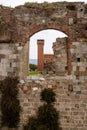 Medieval towers Torre Guelfa and Torre Ghibellina in the Citadella area of Pisa, Tuscany, Italy