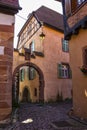 Medieval town. Narrow street ofl village Kaysersberg. Alsace. France Royalty Free Stock Photo