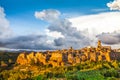 Medieval town of Pitigliano with dramatic clouds at sunset, Tuscany, Italy Royalty Free Stock Photo