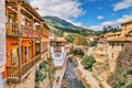 Medieval town of Potes with hanging houses and the Deva river, Cantabria, Spain.