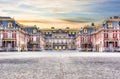 Medieval Versailles palace outside Paris at sunset, France