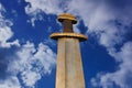 Medieval viking sword against a dramatic sky