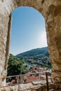 Medieval village of Dolceacqua, arch view perspective during daytime, Italy