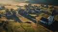 Medieval Village Elegance: Aerial View of Chapel, Unpaved Roads, and Fields