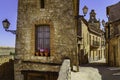 Medieval village with stone houses, cobblestone streets, old doors and windows, arches and walls. Maderuelo Segovia Spain. Europe