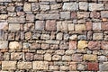 medieval wall from colorful stones as background