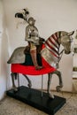 Medieval warrior riding on armored horse. Knight armors and weapons. Castle Bitov, South Moravia Region, Czech Republic