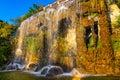 Medieval waterfall off rocky cliff of Colline du Chateau Castle Hill in historic old town district of Nice in France