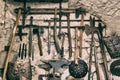 Medieval weapons on a white stone wall. Cool background.