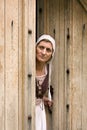 Medieval wench in door